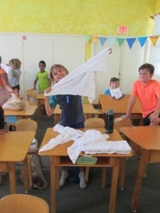 Laundry folding in Earth Skills class.